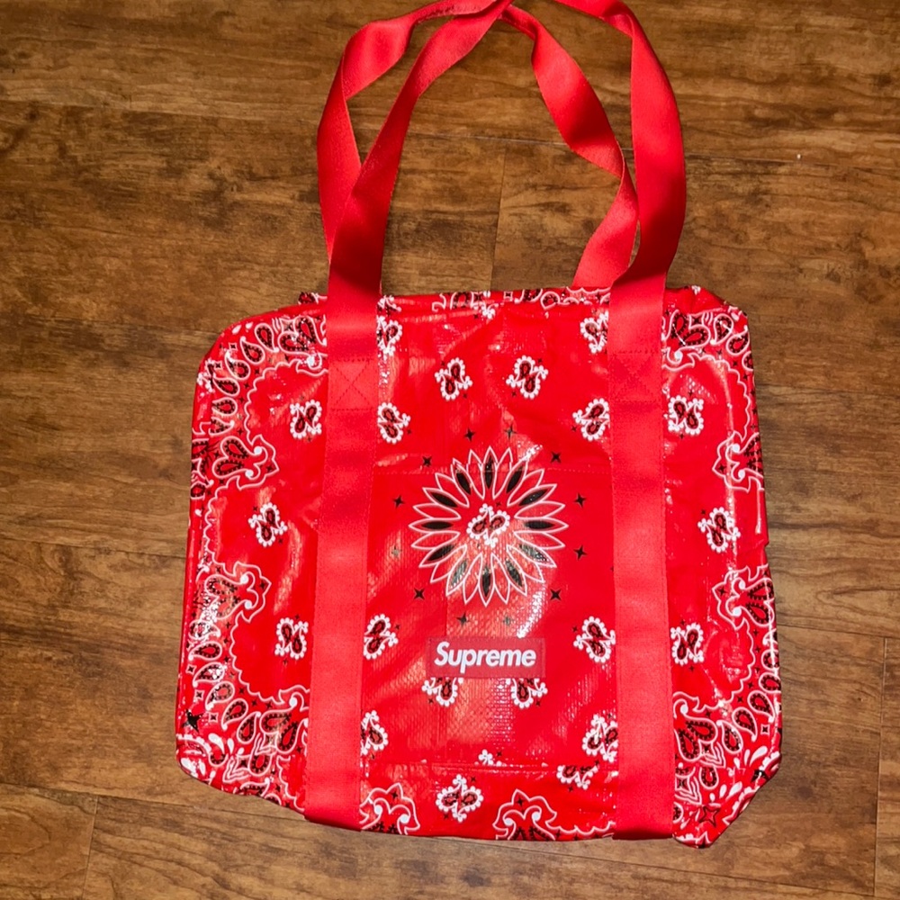 SUPREME RED BANDANA TARP DUFFEL BAG